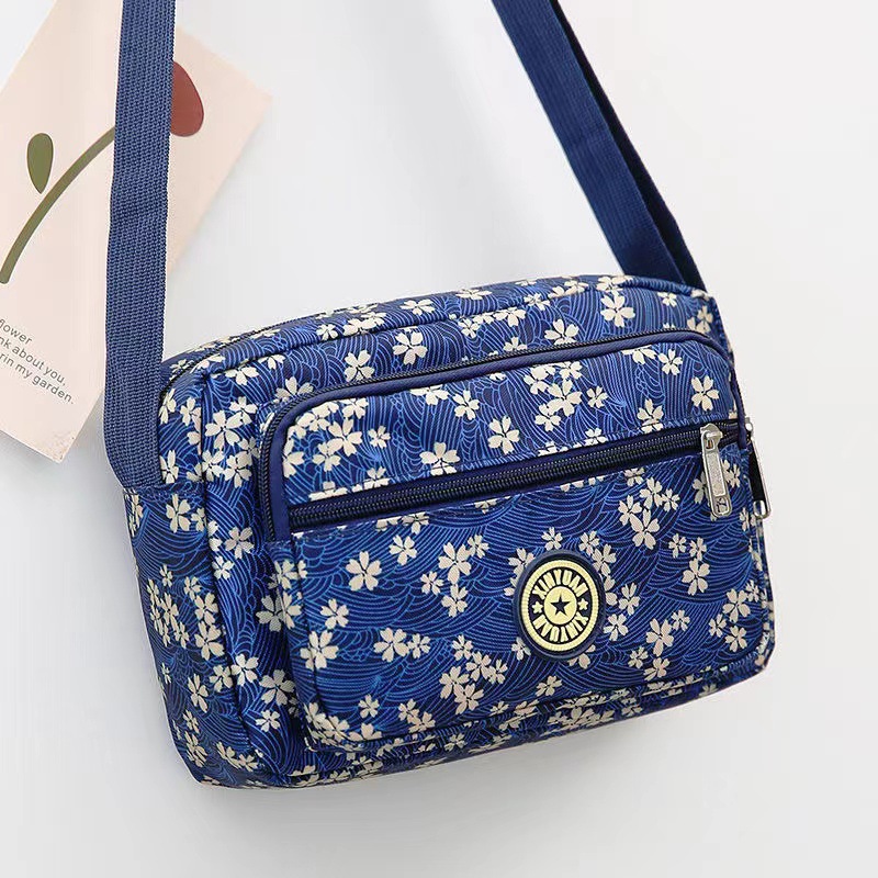 Bolsa de tela de flores bolsa de mensajero de las mujeres nueva bolsa de Madre de gran capacidad bolsa de hombro individual de mediana edad y ancianos bolsa de tela Oxford bolsa