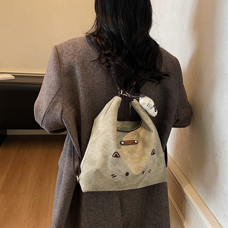 Coreano lindo gato de dibujos animados mochila de hombro de mujer mochila casual de gran capacidad de tres usos de la moda de la mochila de viaje