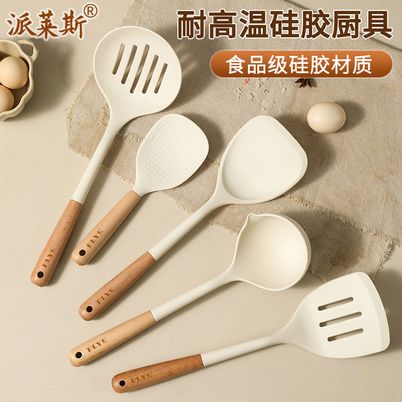 Alemán, pala de cocina doméstica no pegajosa, cubierta de cocina de grado alimenticio, set de siete piezas de cocina de cocina.