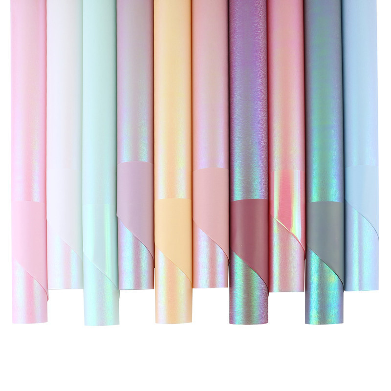 Fábrica de fiestas de flores al por mayor nuevos productos coloridos láser flor de embalaje de flores de color sólido impermeable paquete de papel de embalaje de flores