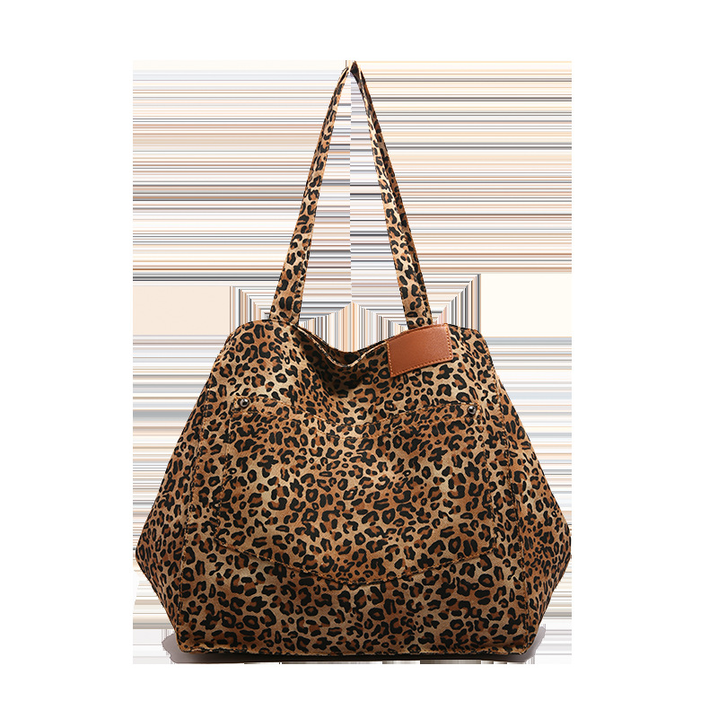 Bolso de mano de lona con estampado de leopardo de nicho Bolso de mujer Bolso de mano de moda de gran capacidad casual Bolso bandolera de estilo occidental coreano