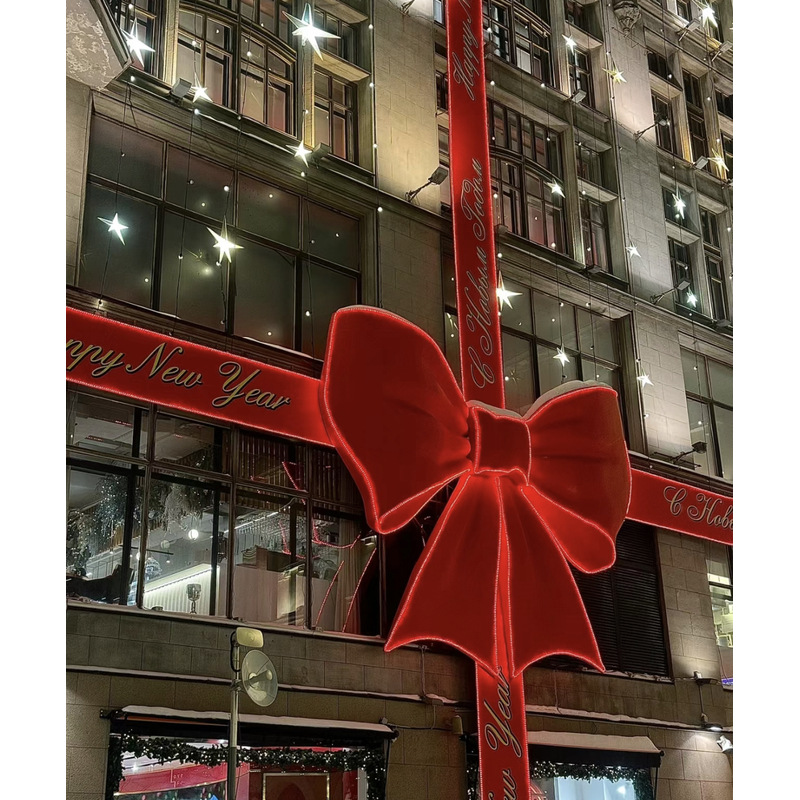 Navidad y Año Nuevo atmósfera decoración de arco luminoso gigante en la puerta del centro comercial arco supergrande