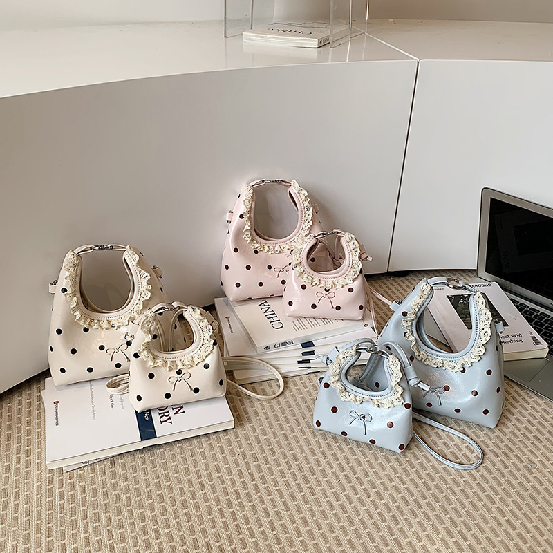 Sweet and cute princess mini bag for girls, lace polka dot small Chanel-style bow parent-child accessory children's crossbody bag
