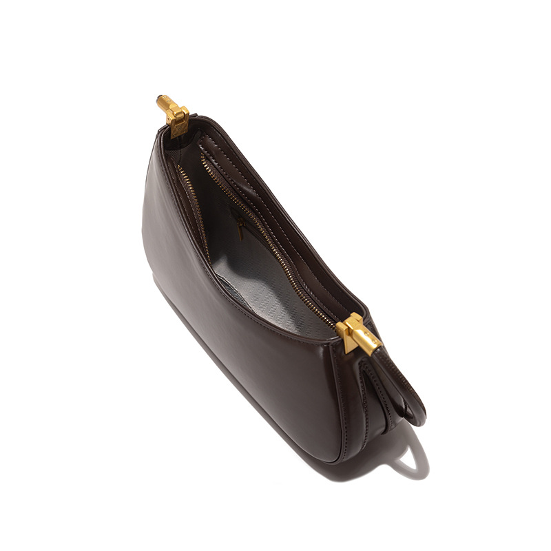 Europa y los Estados Unidos de alta gama retro bolsas de brazo de viaje nicho de alta calidad bolsas de mano de moda versátil de hombro mochila de moda