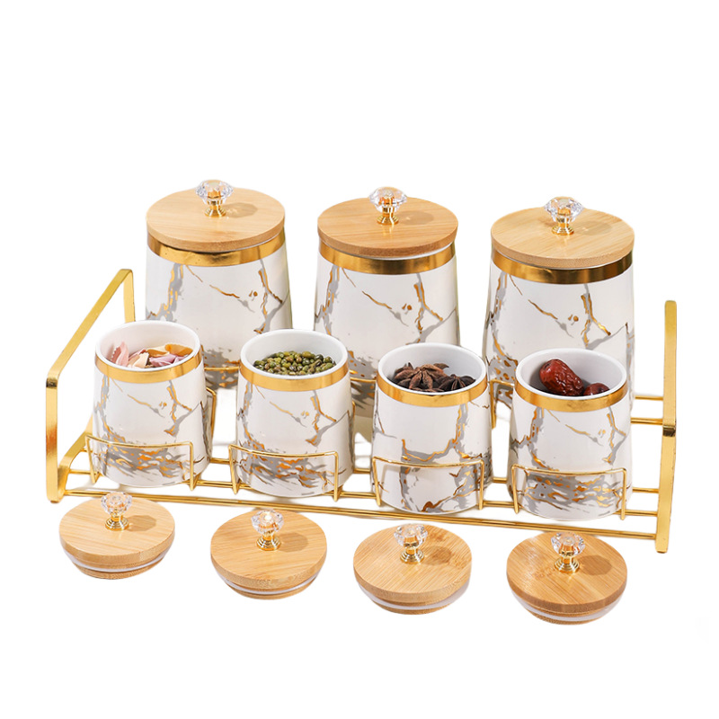 Juego de caja de condimento de comercio exterior de exportación frasco de condimento creativo con estante frasco de sellado de cerámica de lujo ligero frasco de almacenamiento de cocina