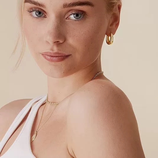 Glossy golden brass earrings, European style, 16 carat