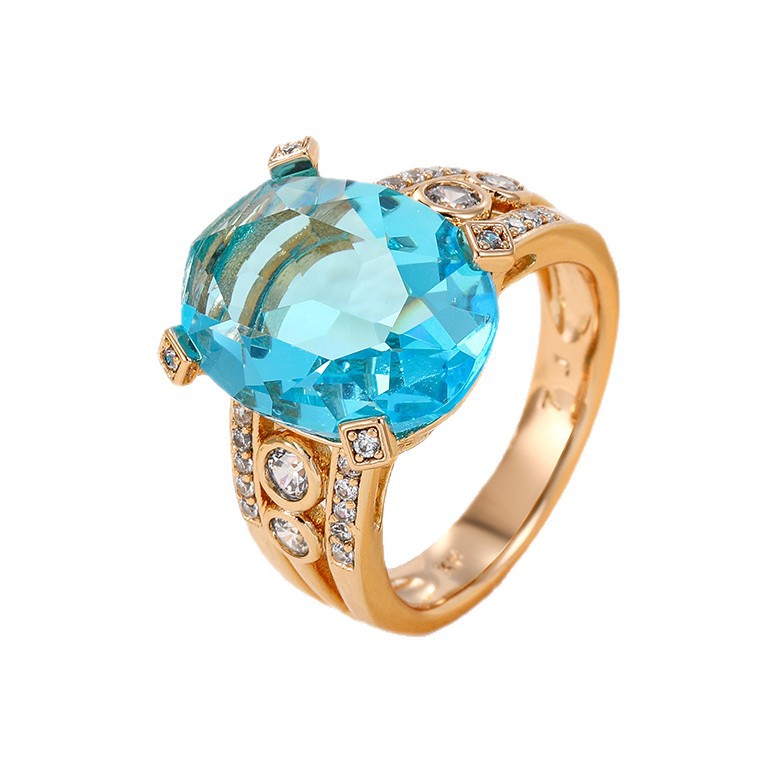 Xuping aleación de cobre chapado 18k estilo lujoso ligero color incrustado anillo de geometría elíptica de zircón único para mujeres