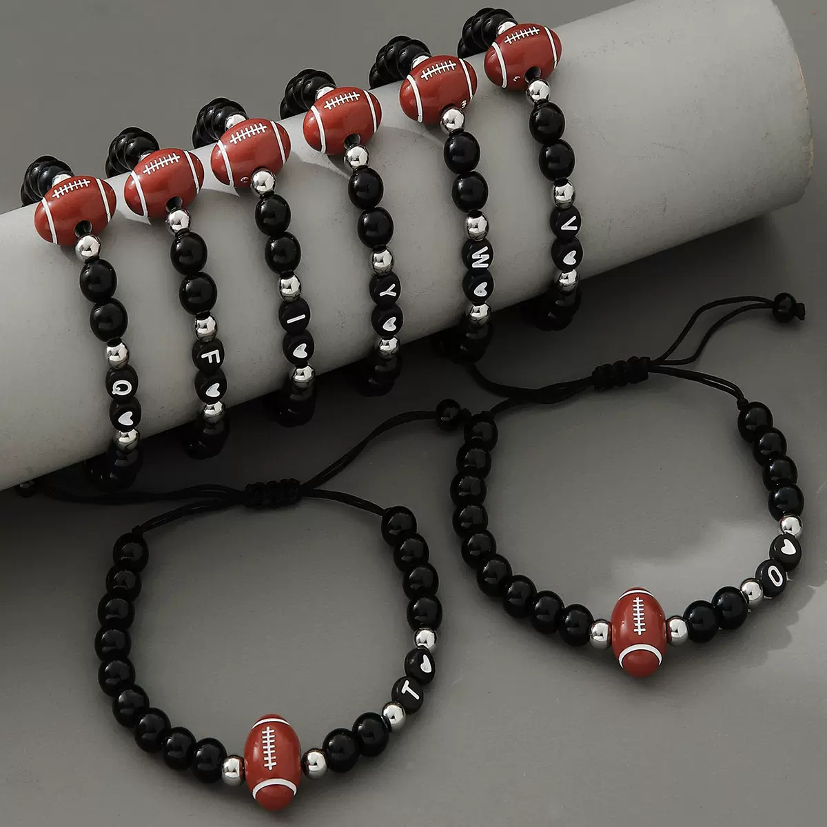 欧美时尚黑亮珠手工编织可调节串珠26字母橄榄球手串男士饰品批发