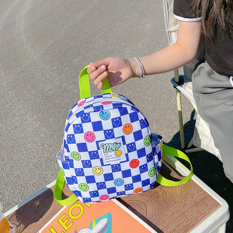 Mochila de color caramelo para niños 2022 nueva mochila de niño casual todo partido niños y niñas lindos mochila anti-Perdida