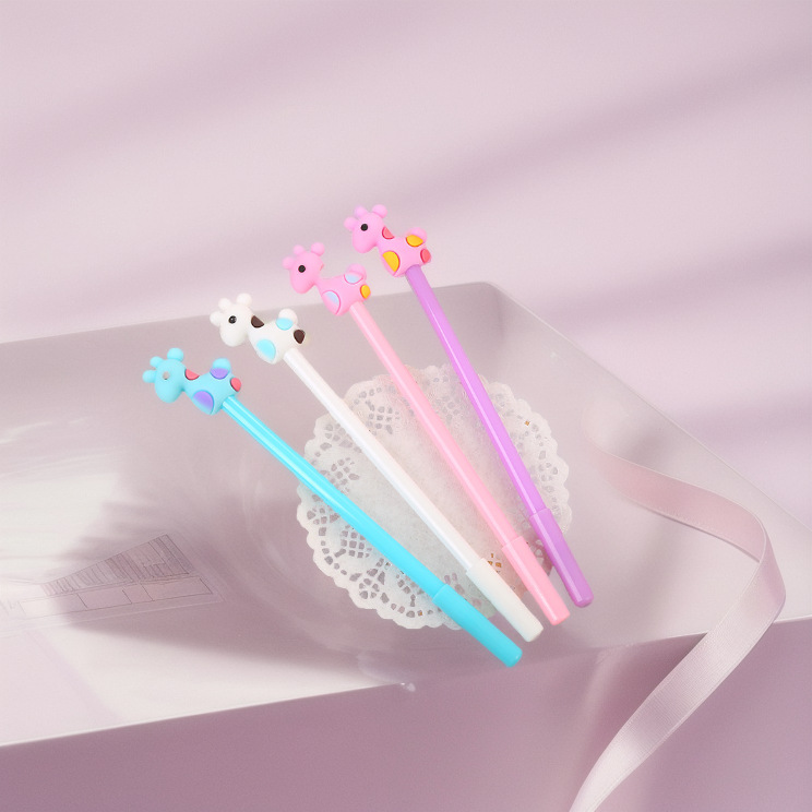 Directo de fábrica creativo rojo ciervo gel pluma lindo aprendizaje papelería dibujos animados cabeza de silicona agua pluma firma pluma al por mayor