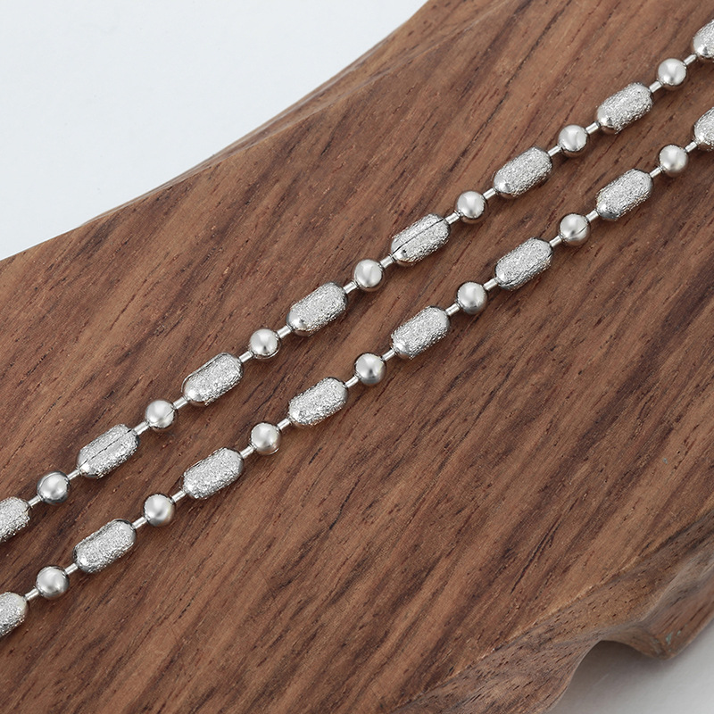 Joyería Xuping moda simple cadena de esferas aleación de cobre chapado blanco sin género cadena cruzada europea y americana cadena al por mayor