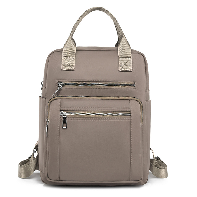 Comercio exterior nueva versión coreana de la mochila Oxford para mujer, mochila de viaje al aire libre de todo fósforo de moda, mochila escolar, bolso