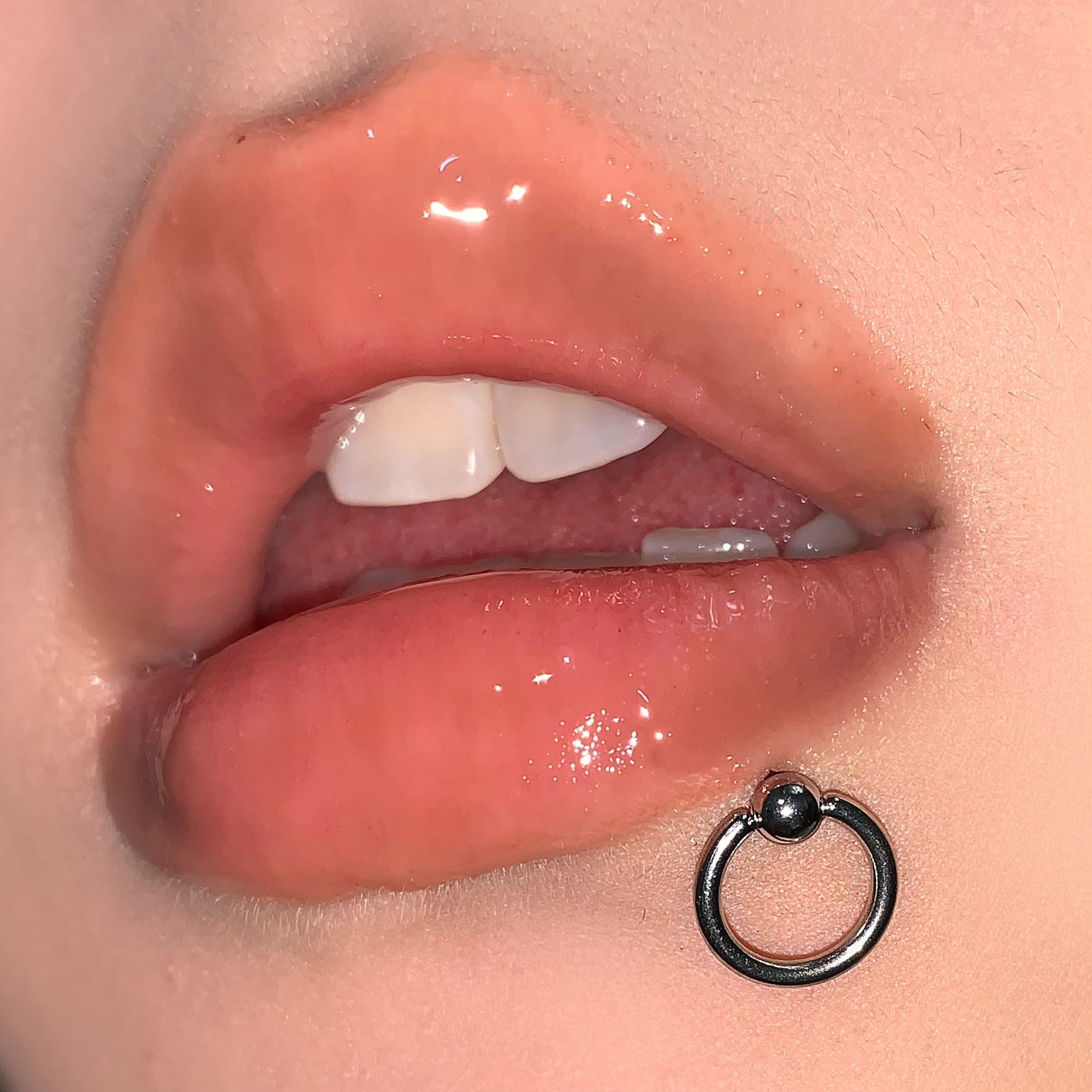 Labret stud lip piercing jewelry styling detail