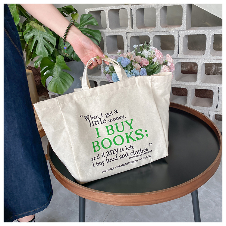 A large-capacity, sturdy Japanese-style canvas bag for women, a new 2022 simple bento handbag for girls to go to work undefined
