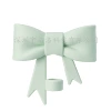 Green straw with bow