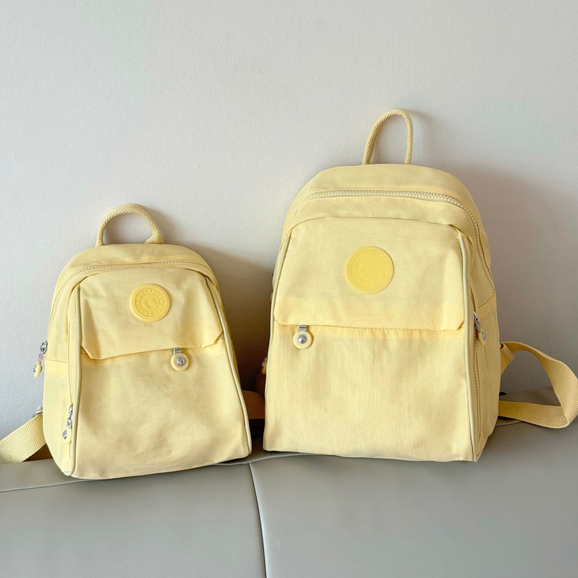 Mochila para mujer, mochila pequeña de tela Oxford de gran capacidad, resistente al agua, nueva mochila escolar de nailon lavanda de todo fósforo de moda