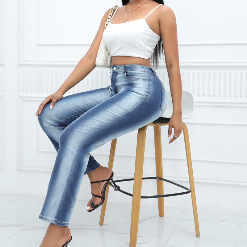 Vaqueros de pierna recta con bloques de color degradados y rayas verticales estilo europeo y americano para mujer, pantalones de mezclilla lavados a rayas de cintura alta que estilizan, exportación.