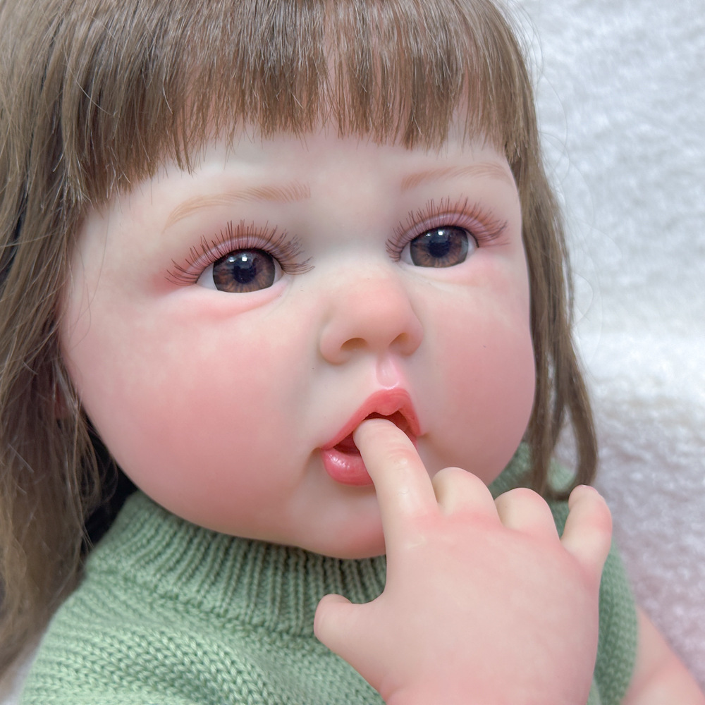 Muñeca pesada para niños pintados de 22 pulgadas de muñecas de regalo de juguetes caseros