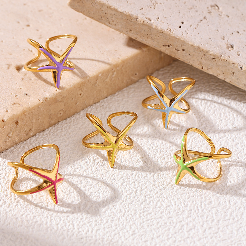 Tina Europa y los Estados Unidos transfronterizos lujo ligero anillo de estrella de mar nicho de diseño de goteo de aceite serie de joyas de mano para mujeres al por mayor