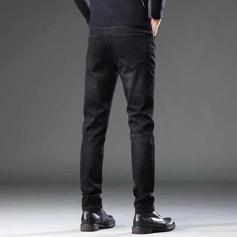 Guangzhou Xintang Pantalones vaqueros de los hombres de otoño e invierno nuevos Pantalones rectos regulares de los hombres jóvenes simples pantalones a juego