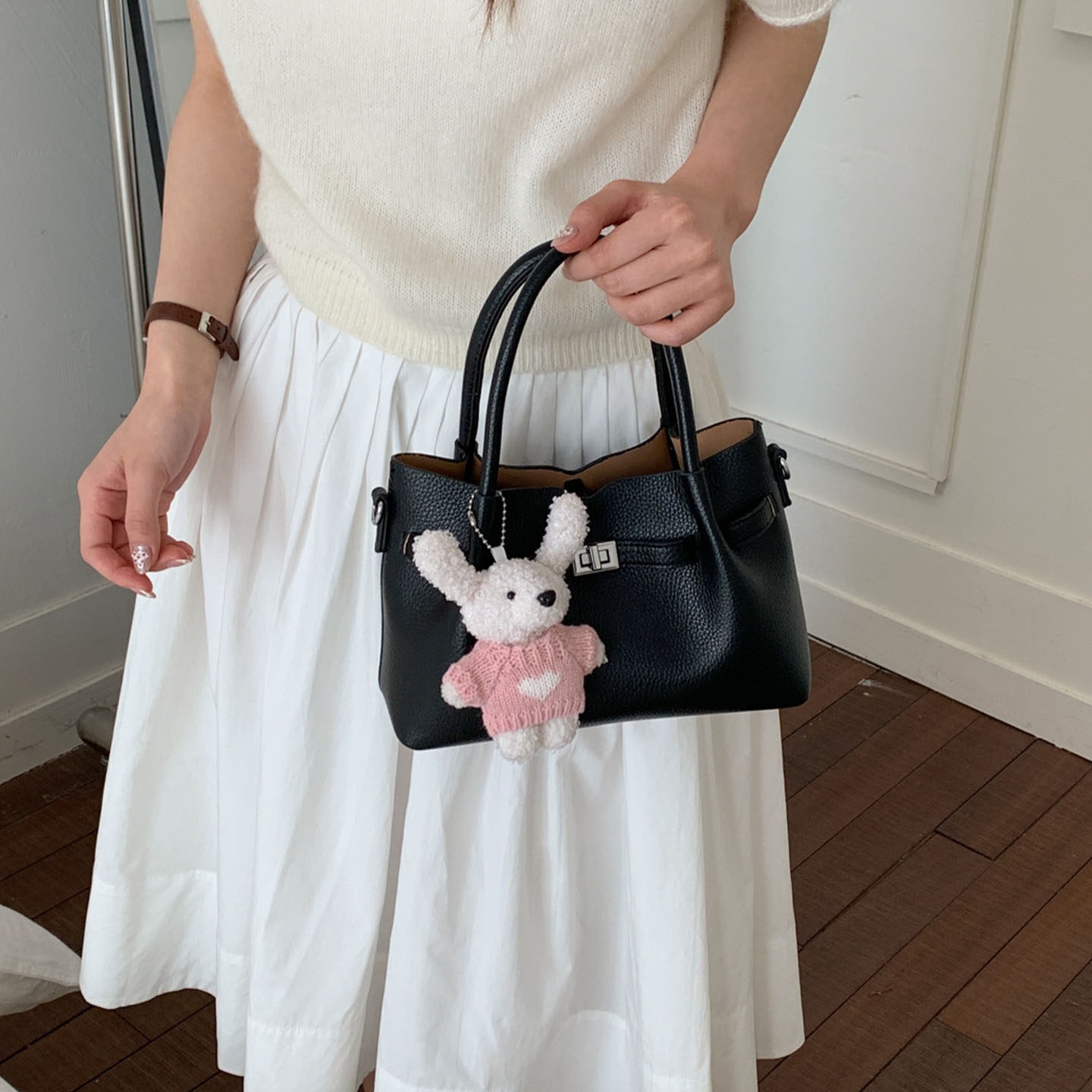 Simple portátil 2026 diseño de bolso de hombro único versátil estilo coreano de transporte de moda nuevo bolso de cubo nicho femenino