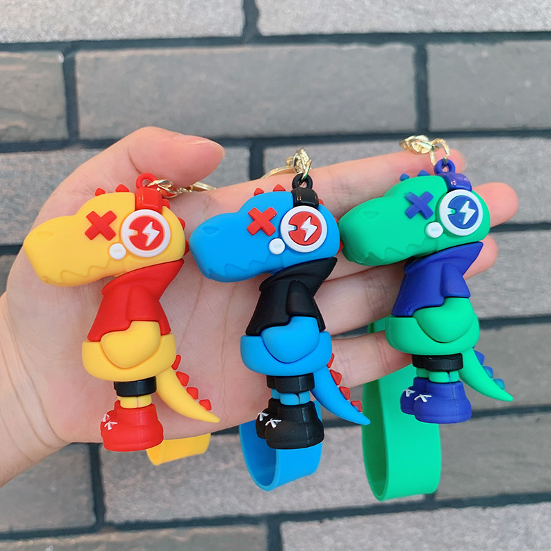 Dinosauro llavero música rayo pequeño dinosaurio muñeca de silicona bolso llavero de automóvil colgante moda regalos frescos