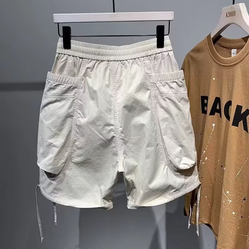 Monos de moda casuales de verano, pantalones de cinco puntos, pantalones cortos casuales microelásticos y transpirables para hombres, nuevos pantalones cortos multibolsillos