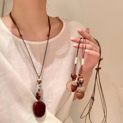 新しい中国風のレトロな禅デザイン植物ドングリ織りロングネックレス女性のアクセサリーネックレスセーターチェーン