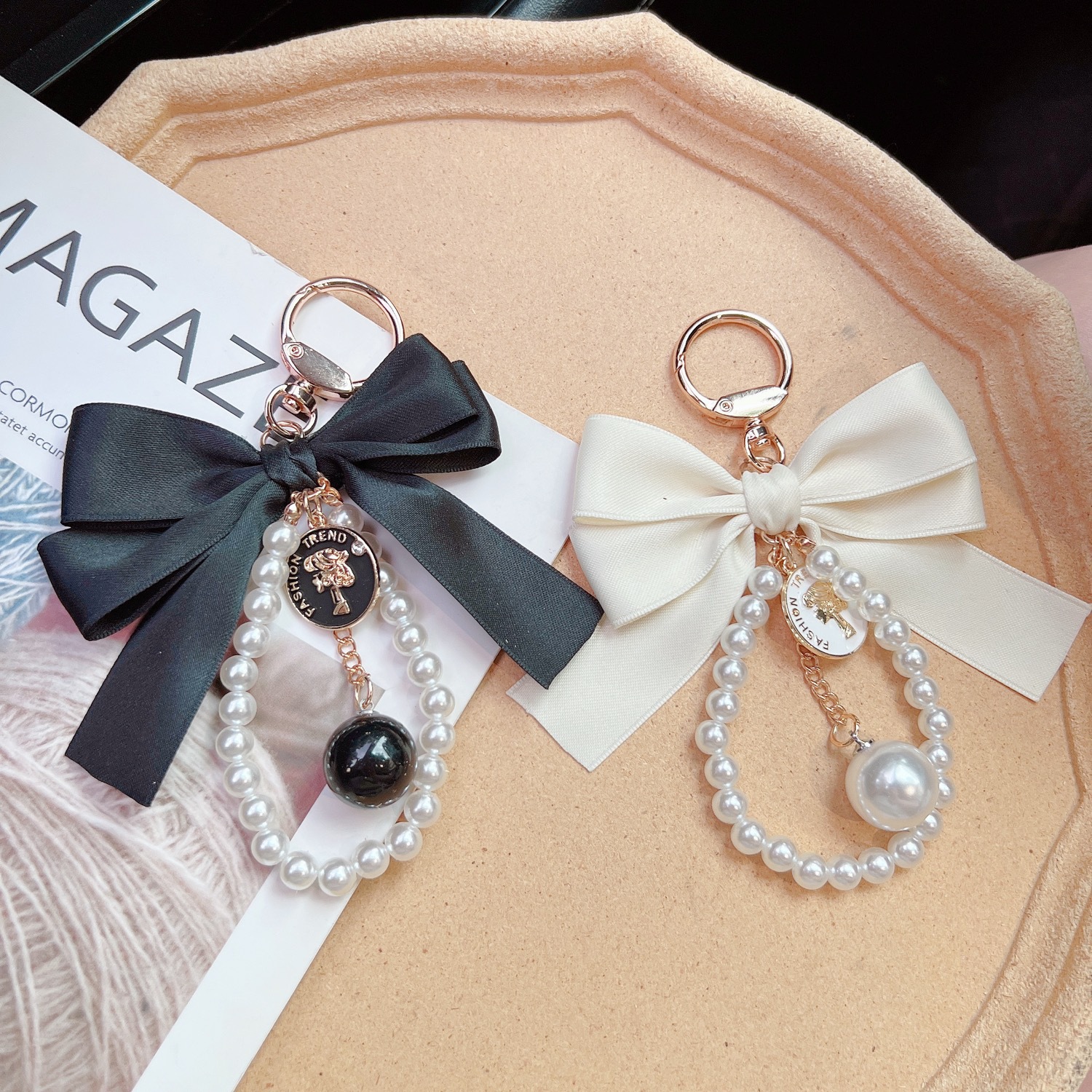 Arco fragante coreano cabeza de mujer llavero de perlas bolsos personales colgantes decoración fábrica al por mayor