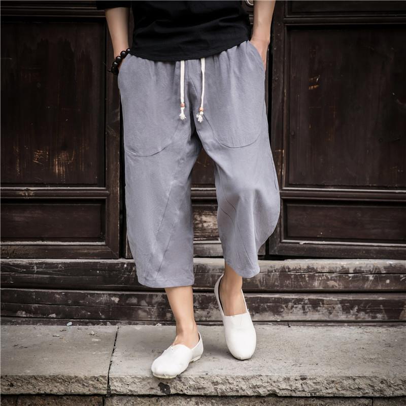 Pantalones cortos sueltos de algodón y lino de gran tamaño 7 de moda estilo chino pantalones grandes para hombres pantalones cortos casuales de lino ancho gordo verano
