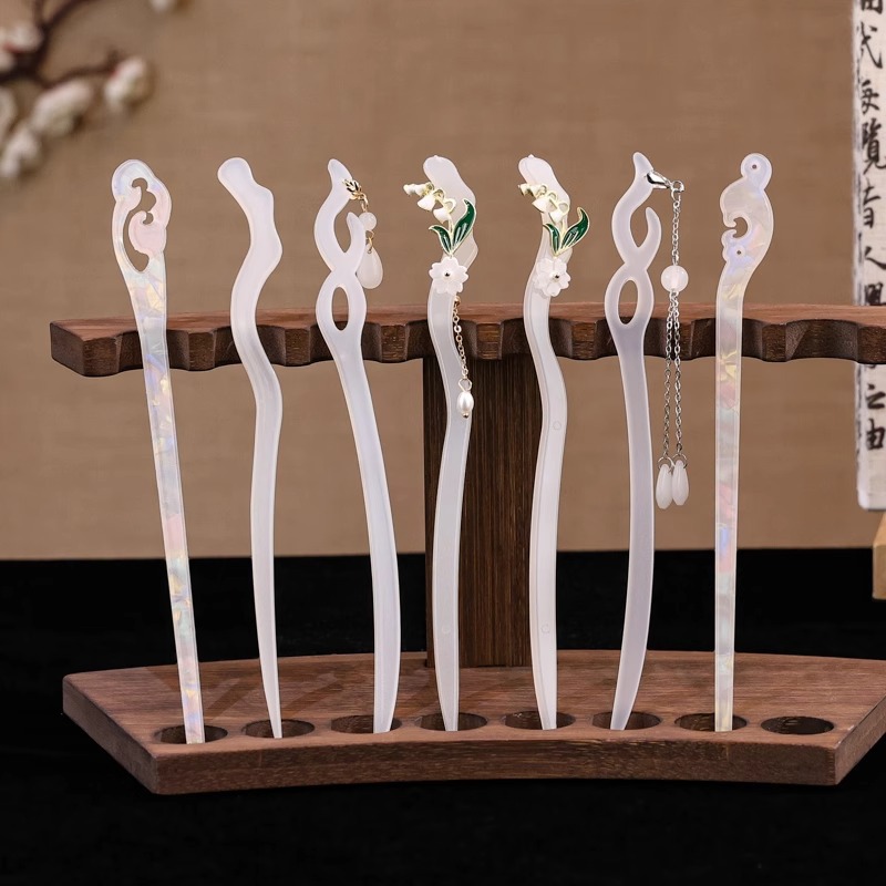 Nueva horquilla china 2025 nuevo estilo estilo antiguo horquilla mujer falda de cara de caballo de alta calidad estilo nacional horquilla de madera paso a paso horquilla tocado