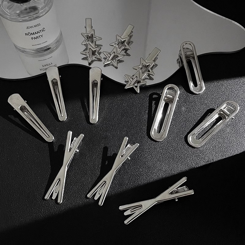 Fijación de cabello de metal fría plata en forma de clip de nariz de pato temperamento agujero estrellas clip de cabello frente lateral clip de cabello roto mujer