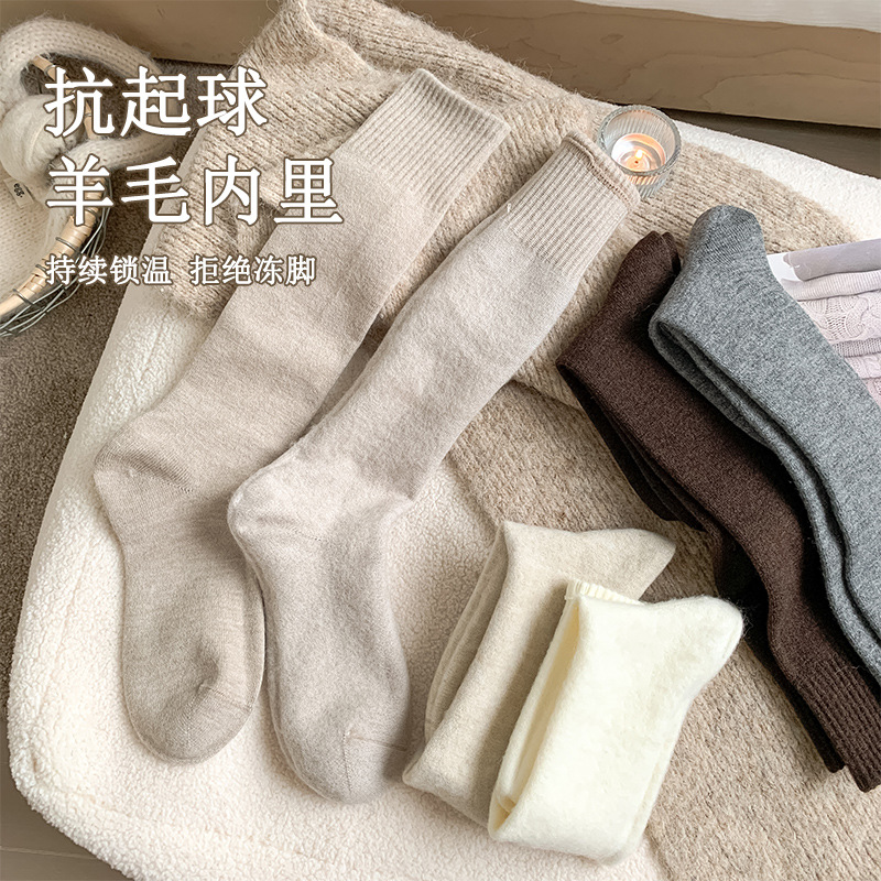 Calcetines de mujer invierno engrosado calcetines de oveja invierno calcetines de calcetines de mujer al por mayor