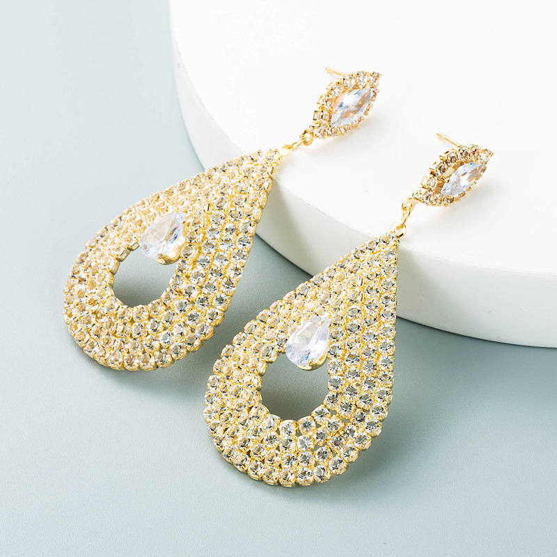 Fashion Hollow Alloy Inlaid Rhinestone Triangle Earrings Wholesale Nihaojewelry display picture 4