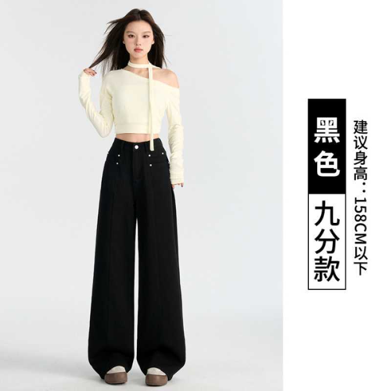 春と秋のカレー色のストレートジーンズの女性のゆったりとしたレトロなハイウエストはやせています。|undefined