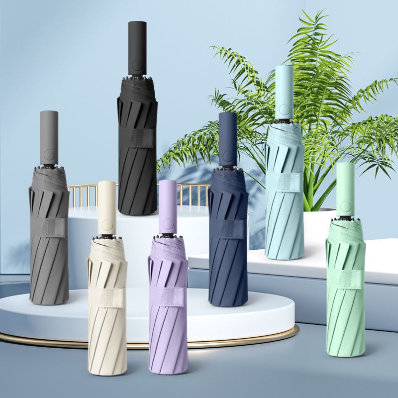 Nuevo 12-Bone 24-Bone 60-Bone automático pegamento negro paraguas de protección solar extra grande paraguas de tres veces paraguas de regalo de gama alta