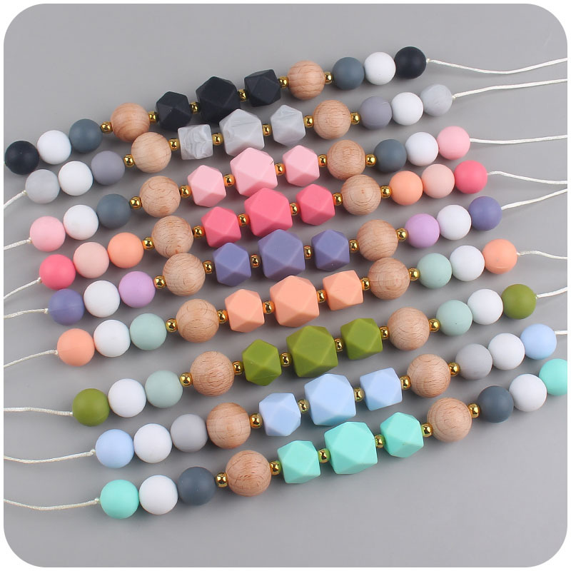 Los nuevos bebés de contraste de color de silicona octogonal mordedor collar de los bebés mordedor palo masticable colgante collar