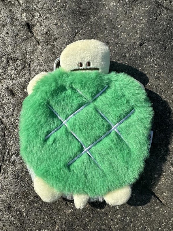 オリジナルのかわいい亀の変な表情シリーズのぬいぐるみの座布団の筆袋の小銭入れの首のイヤホンの包みのプレゼント