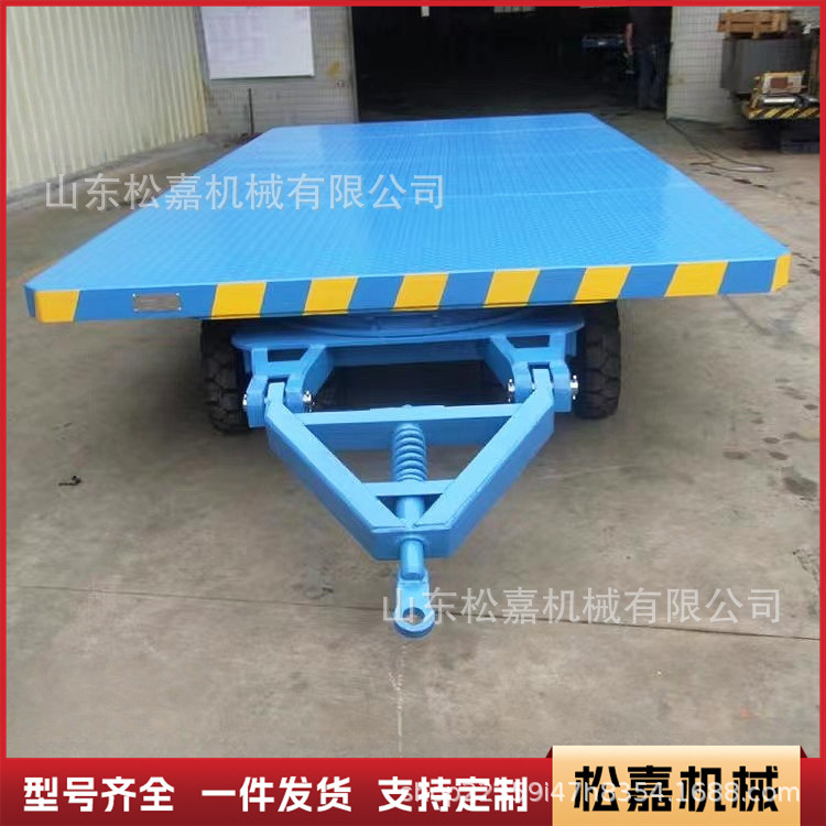 Carretilla elevadora remolque de plataforma plana camión de transferencia de carga de fábrica pesada camión de rotación de taller de dirección de cuatro ruedas de gran tonelaje