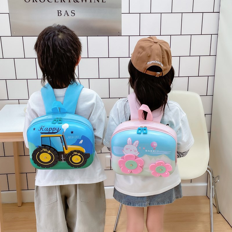 Mochila infantil de casca dura de dibujos animados de moda para niños ingeniería de automóviles ligeros mochila divertida para niñas conejos pequeños y medianos