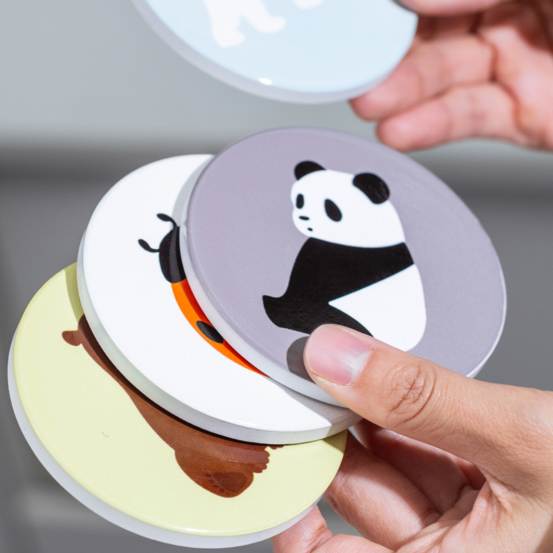 Creativa original de dibujos animados cerámica taza cojín de taza de agua cojín de comedor con patrón de impresión publicitaria LOGO regalos