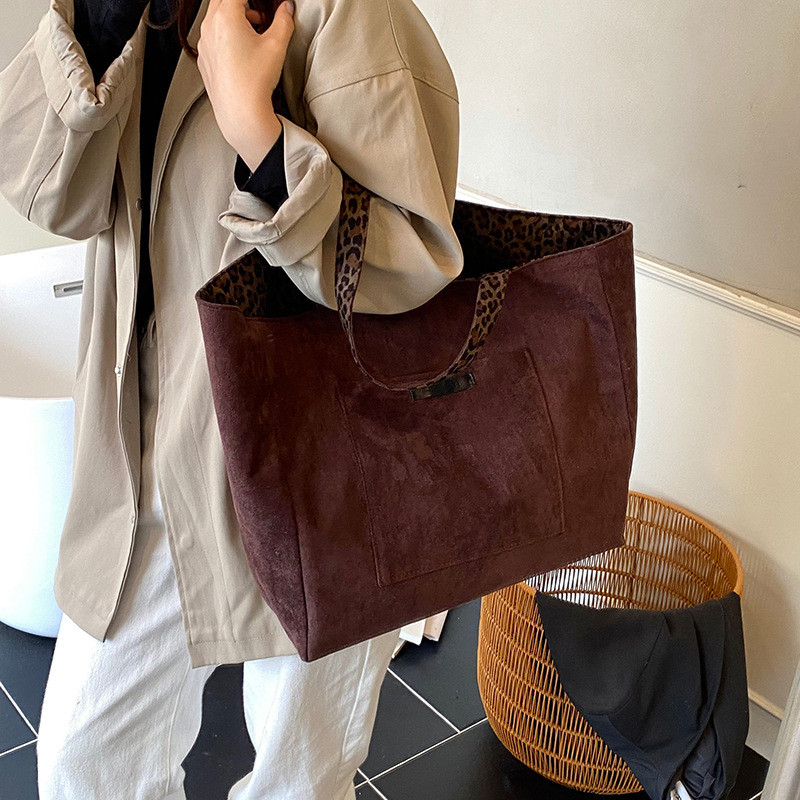 Europa y los Estados Unidos retro leopardo para hombres y mujeres bolsos de hombro bolsos de viaje de gran capacidad bolsos de mano de cacho de invierno niños bolsos de mochila