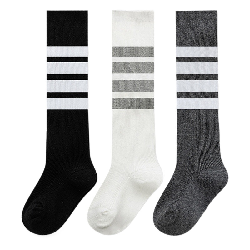 2023 nuevos calcetines para niños primavera y otoño calcetines largos sobre la rodilla calcetines para niños y niñas estilo universitario medias al por mayor