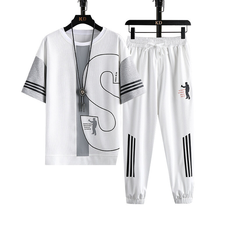 Una pieza de generación de cabello traje de moda de estilo caliente de verano para hombres, camiseta de manga corta de tendencia para hombres, pantalones casuales, traje de dos piezas