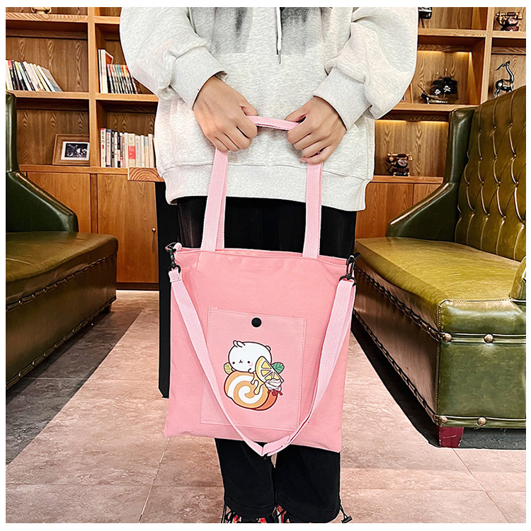 The new Korean-style cute Japanese-style single-shoulder bag is selling well. It's a simple and versatile canvas bag for college students' crossbody tutoring full figure