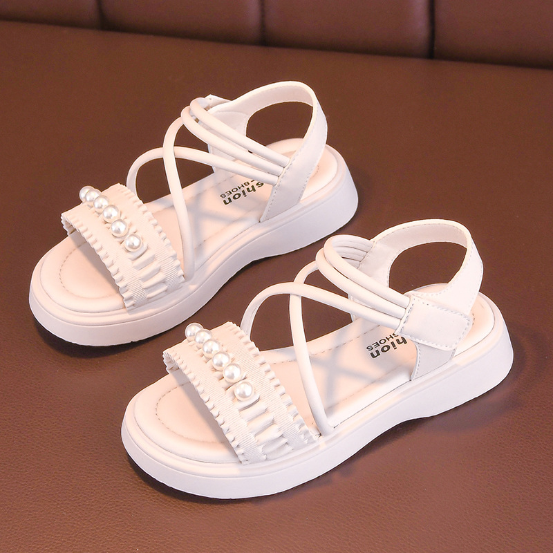 Sandalias para niñas 2025 verano nuevo estilo zapatos de princesa para niños zapatos de playa de suela suave antideslizante de suela suave zapatos para niñas de mediana edad
