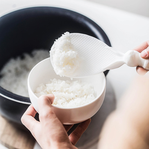 Household upright cartoon rabbit rice shovel rice cooker rice spoon wheat straw creative non-stick rice spoon manufacturer