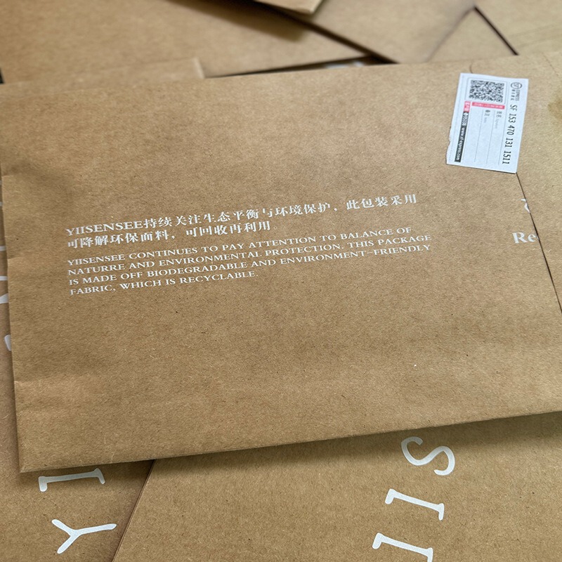 Factory in stock kraft paper bag environmental express bag t-shirt jeans self-adhesive waterproof packing bag logo Factory in stock kraft paper bag environmental express bag t-shirt jeans self-adhesive waterproof packing bag logo