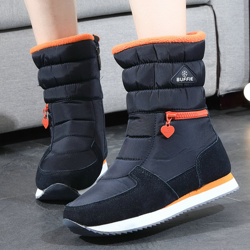 Botas de nieve de las mujeres de fondo plano a media pantorrilla impermeable cremallera engrosada zapatos de algodón transfronterizo Taobao suministro al por mayor entrega de una sola pieza