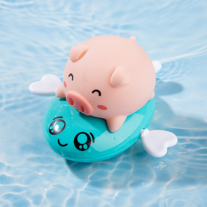 赤ちゃんのお風呂のおもちゃの子供の水泳の水遊びの小さいカメの花は男の子の女の子をこぼして音を震わせて水の小さいアヒルのおもちゃを遊びます。|undefined